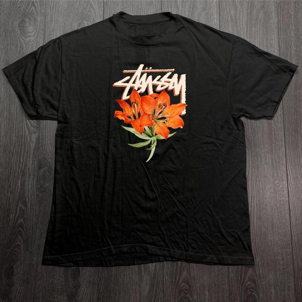 Black Stussy Tee With Orange Lily Design